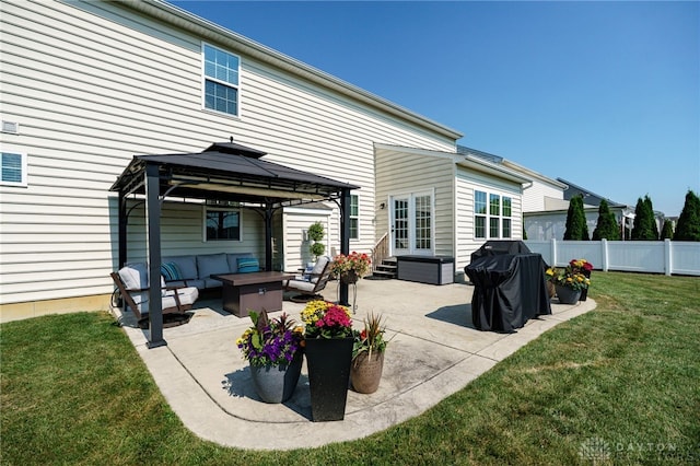 2937 E Ambrosia Ln, Xenia, OH 45385 - rear view of property with an outdoor living space with a fire pit, a patio area, a gazebo, and entry steps