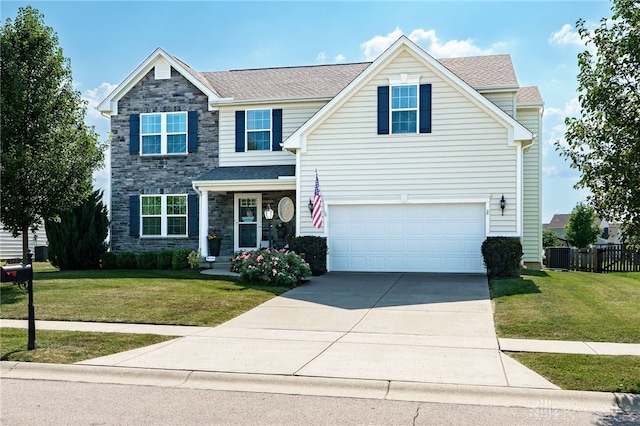 2937 E Ambrosia Ln, Xenia, OH 45385 - traditional-style home featuring stone siding, driveway, and an attached garage