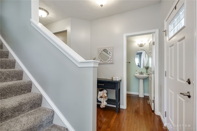 2937 E Ambrosia Ln, Xenia, OH 45385 - stairs with wood finished floors and baseboards