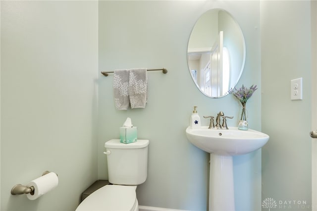 2937 E Ambrosia Ln, Xenia, OH 45385 - bathroom featuring toilet and a sink