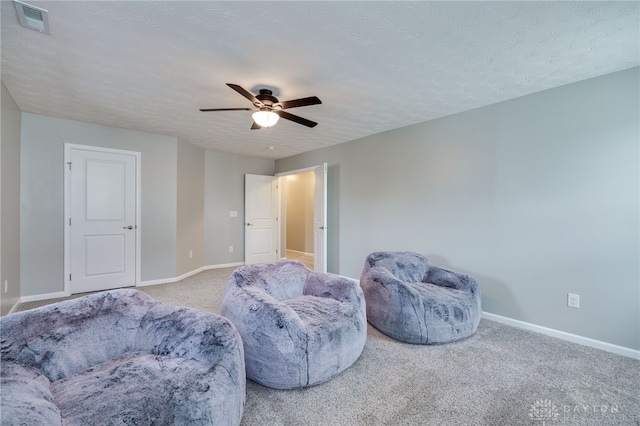 2937 E Ambrosia Ln, Xenia, OH 45385 - sitting room with a ceiling fan, carpet, and a textured ceiling
