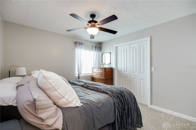 2937 E Ambrosia Ln, Xenia, OH 45385 - bedroom featuring a closet, light colored carpet, and a ceiling fan