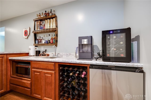 2937 E Ambrosia Ln, Xenia, OH 45385 - indoor wet bar with stainless steel microwave, refrigerator, and beverage cooler