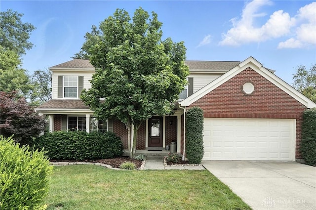 7793 Birchwood Ct, Mason, OH 45040 - view of front of home with driveway, a front lawn, an attached garage, and brick siding