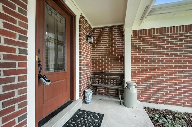 7793 Birchwood Ct, Mason, OH 45040 - entrance to property featuring covered porch and brick siding
