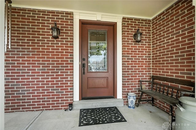 7793 Birchwood Ct, Mason, OH 45040 - doorway to property with brick siding and a porch