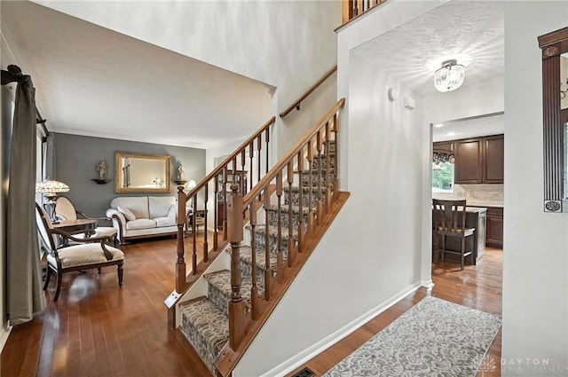 7793 Birchwood Ct, Mason, OH 45040 - stairs with wood finished floors and baseboards