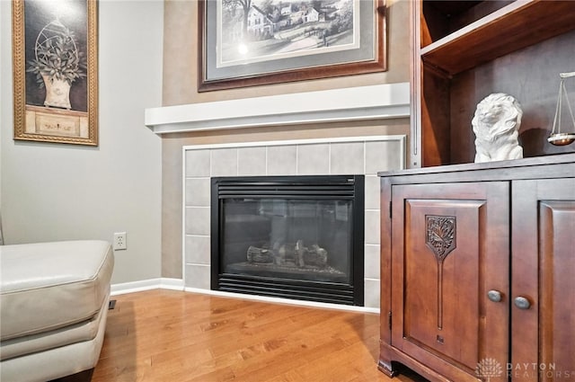 7793 Birchwood Ct, Mason, OH 45040 - detailed view of wood finished floors and a fireplace