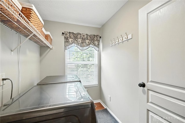 7793 Birchwood Ct, Mason, OH 45040 - laundry area with independent washer and dryer and baseboards