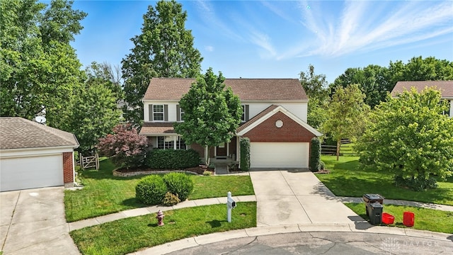 7793 Birchwood Ct, Mason, OH 45040 - view of front of home featuring driveway, a garage, and brick siding