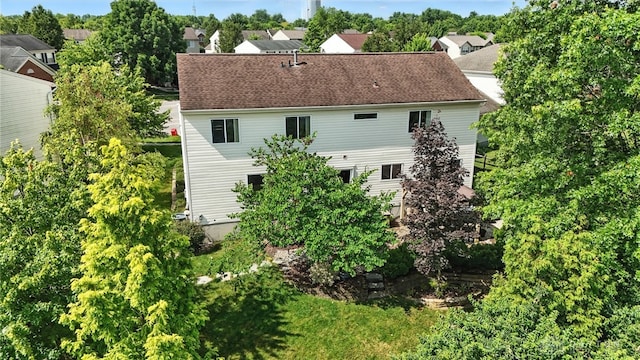 7793 Birchwood Ct, Mason, OH 45040 - rear view of house featuring a shingled roof