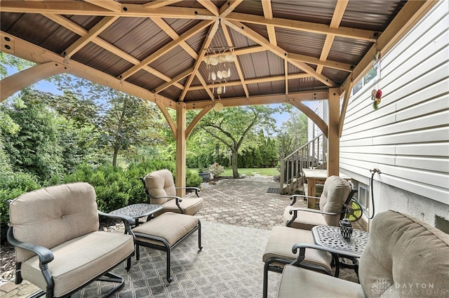 7793 Birchwood Ct, Mason, OH 45040 - view of patio featuring a gazebo, view of wooded area, and stairway