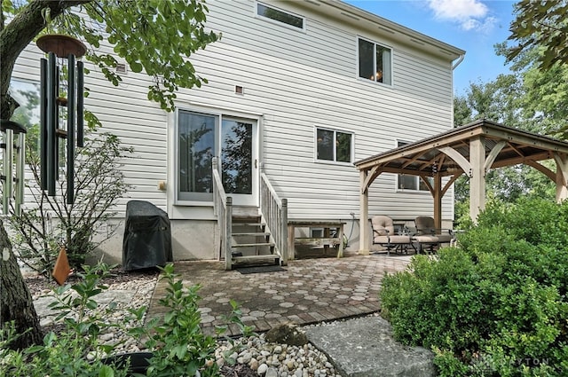 7793 Birchwood Ct, Mason, OH 45040 - back of property with a gazebo, entry steps, and a patio