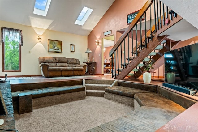 4230 Wagner Rd, Dayton, OH 45440 - living room with a skylight, high vaulted ceiling, and stairway