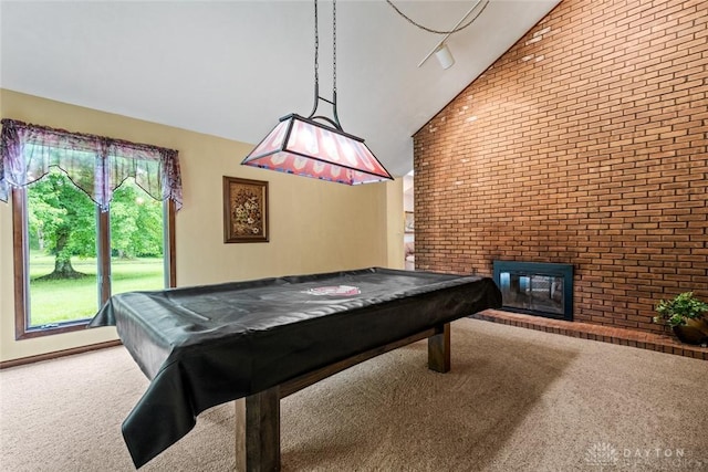 4230 Wagner Rd, Dayton, OH 45440 - rec room featuring carpet floors, brick wall, pool table, a brick fireplace, and high vaulted ceiling