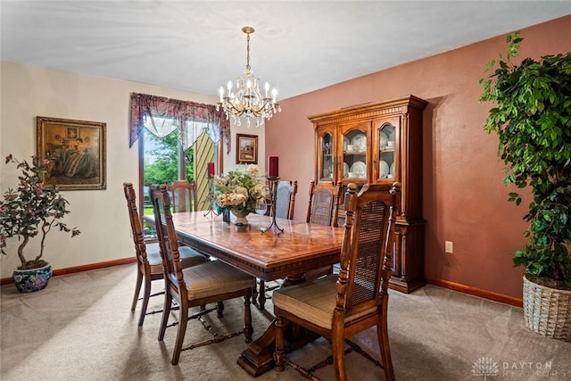 4230 Wagner Rd, Dayton, OH 45440 - dining area with a chandelier and light colored carpet
