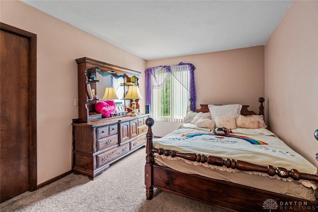 4230 Wagner Rd, Dayton, OH 45440 - bedroom featuring light colored carpet and baseboards
