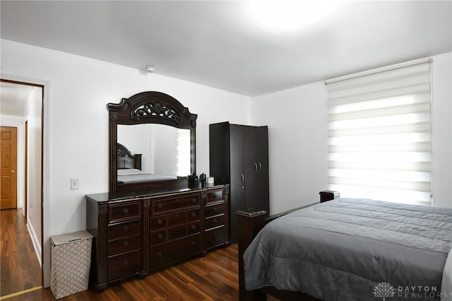 719 N Keowee St, Dayton, OH 45404 - bedroom featuring dark wood-style flooring
