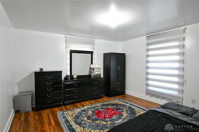 719 N Keowee St, Dayton, OH 45404 - bedroom with dark wood-style floors