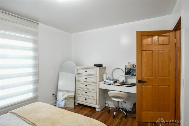 719 N Keowee St, Dayton, OH 45404 - bedroom featuring dark wood-style flooring