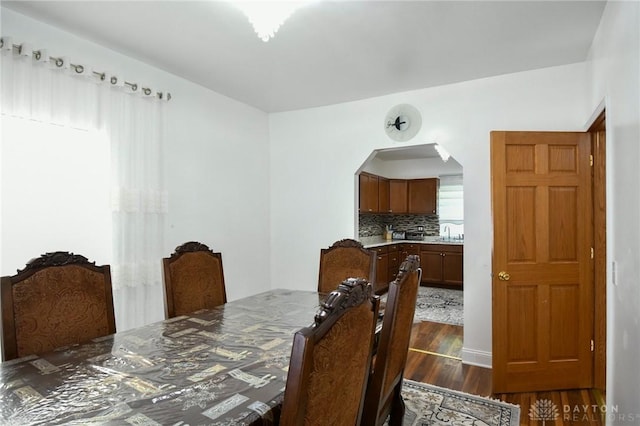 719 N Keowee St, Dayton, OH 45404 - dining space with wood finished floors and arched walkways