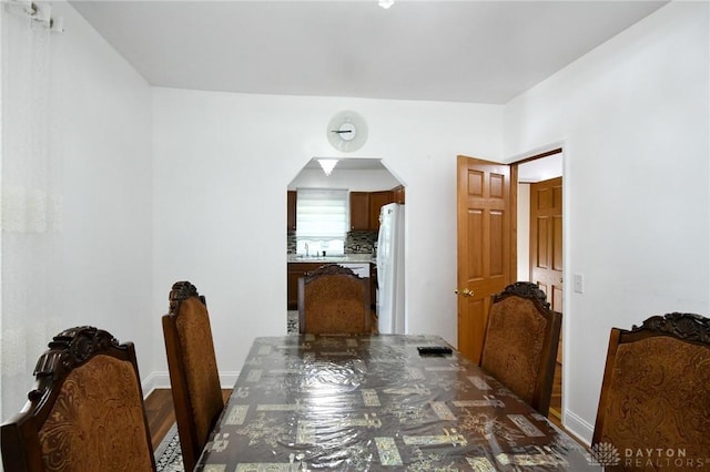 719 N Keowee St, Dayton, OH 45404 - dining room featuring arched walkways