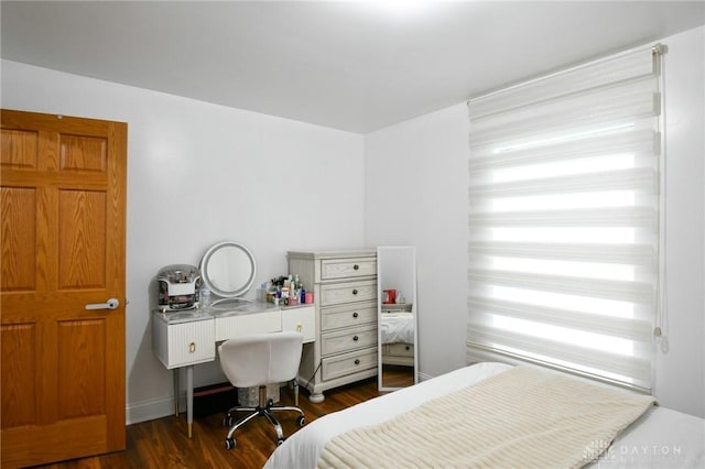 719 N Keowee St, Dayton, OH 45404 - bedroom with dark wood-type flooring
