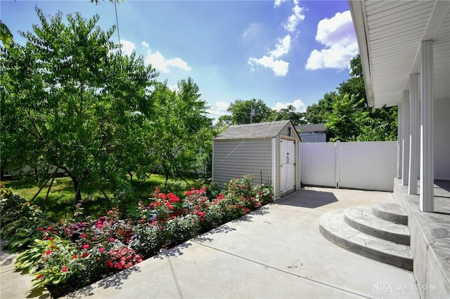 719 N Keowee St, Dayton, OH 45404 - view of patio featuring a storage shed