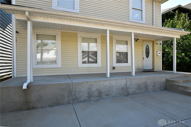 719 N Keowee St, Dayton, OH 45404 - view of exterior entry with a porch