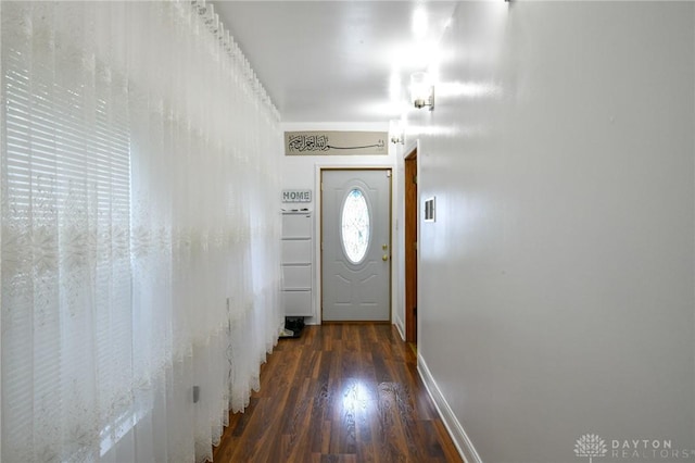 719 N Keowee St, Dayton, OH 45404 - entryway featuring baseboards and wood finished floors