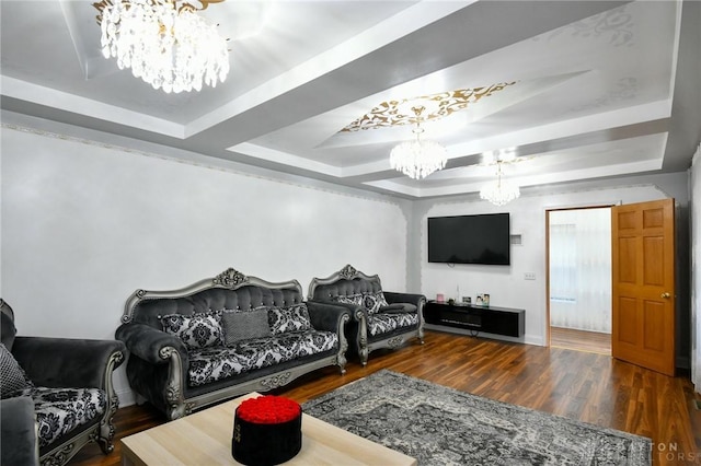 719 N Keowee St, Dayton, OH 45404 - living room with a chandelier, a raised ceiling, and wood finished floors