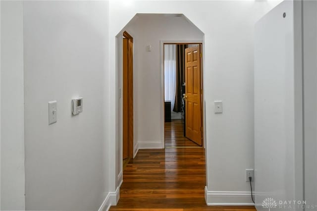 719 N Keowee St, Dayton, OH 45404 - corridor featuring dark wood-style floors and arched walkways