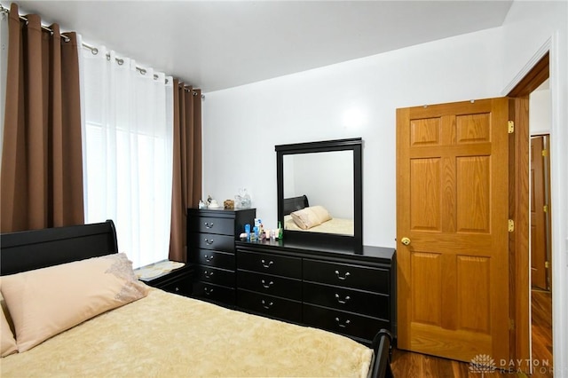 719 N Keowee St, Dayton, OH 45404 - bedroom with wood finished floors