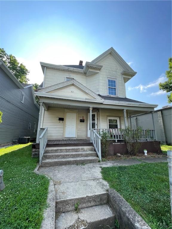 419 Baltimore St, Middletown, OH 45044 - view of front of house with a porch and a front yard