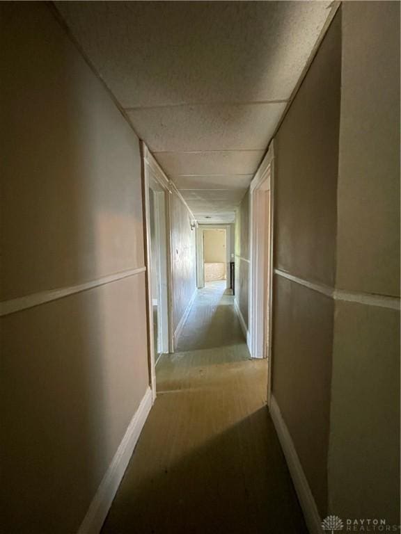 419 Baltimore St, Middletown, OH 45044 - hallway featuring baseboards and a paneled ceiling
