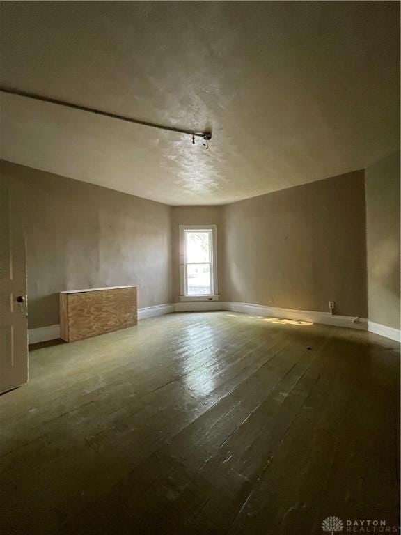 419 Baltimore St, Middletown, OH 45044 - spare room with baseboards and hardwood / wood-style floors