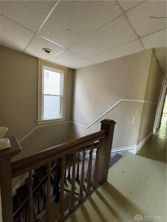 419 Baltimore St, Middletown, OH 45044 - staircase with a paneled ceiling and baseboards