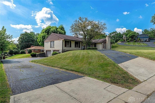 5282 Rahway Ct, Clayton, OH 45415 - ranch-style home featuring a garage, driveway, and a front yard