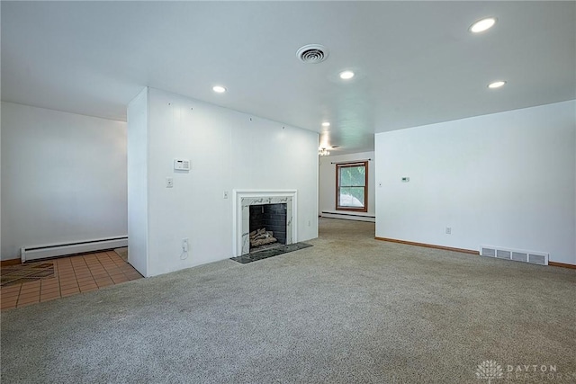 5282 Rahway Ct, Clayton, OH 45415 - unfurnished living room featuring a baseboard heating unit, carpet floors, recessed lighting, a high end fireplace, and a baseboard radiator