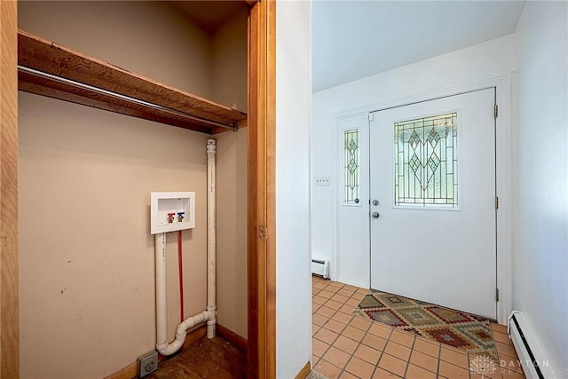 5282 Rahway Ct, Clayton, OH 45415 - washroom featuring baseboard heating, washer hookup, and light tile patterned flooring