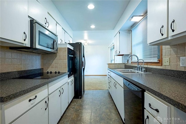 5282 Rahway Ct, Clayton, OH 45415 - kitchen featuring black appliances, dark countertops, white cabinetry, and recessed lighting