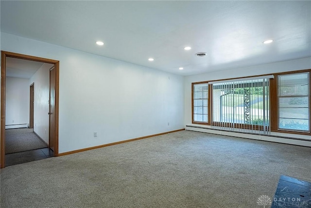 5282 Rahway Ct, Clayton, OH 45415 - spare room featuring carpet, a baseboard heating unit, and recessed lighting