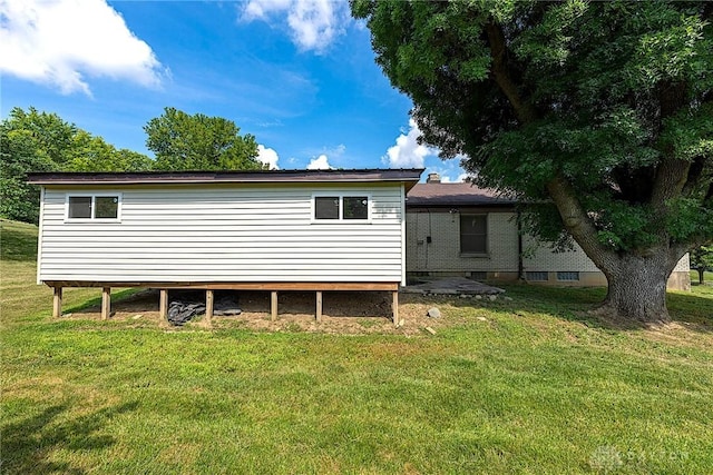 5282 Rahway Ct, Clayton, OH 45415 - rear view of house featuring a lawn