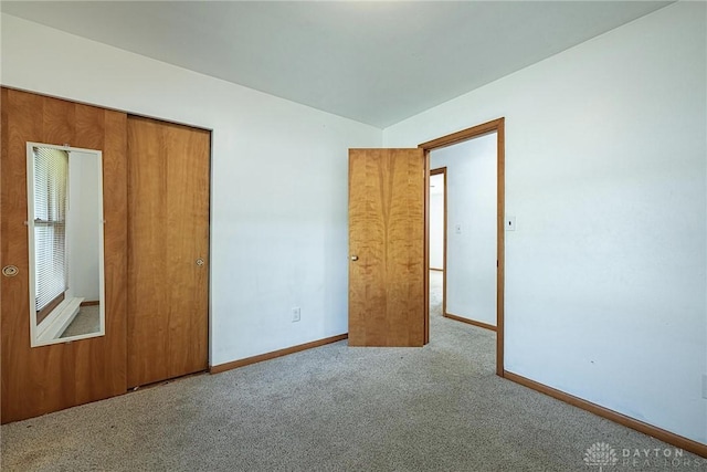 5282 Rahway Ct, Clayton, OH 45415 - unfurnished bedroom with carpet flooring, a closet, and lofted ceiling