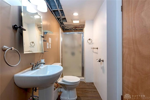 5282 Rahway Ct, Clayton, OH 45415 - bathroom featuring a stall shower and wood finished floors