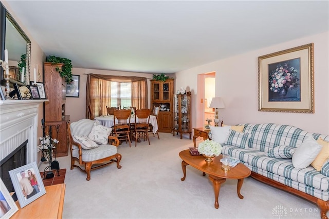 1269 Redbud Dr, Fairborn, OH 45324 - living room featuring a fireplace and carpet flooring