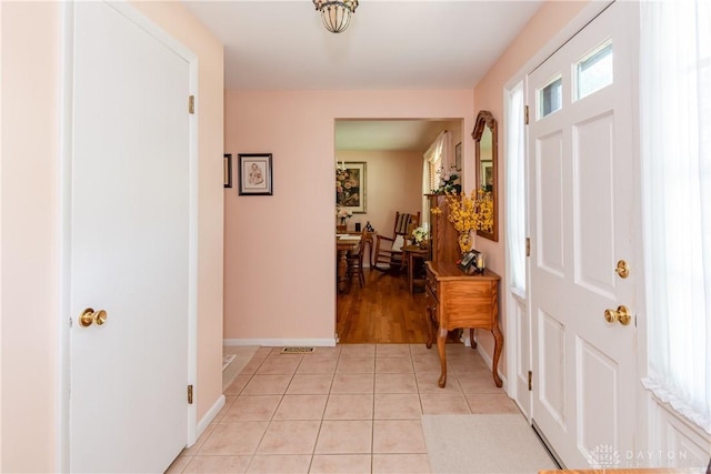 1269 Redbud Dr, Fairborn, OH 45324 - entryway with light tile patterned flooring and baseboards