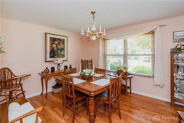 1269 Redbud Dr, Fairborn, OH 45324 - dining space with a chandelier and light wood finished floors