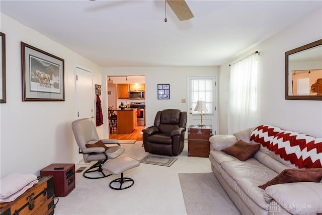 1269 Redbud Dr, Fairborn, OH 45324 - living area featuring ceiling fan and light colored carpet