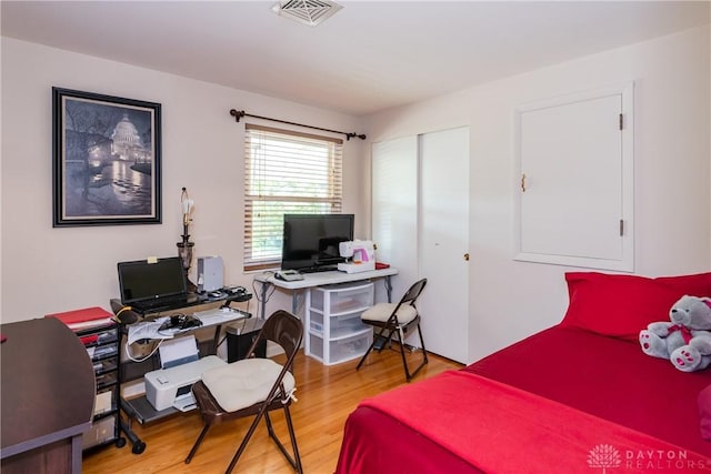 1269 Redbud Dr, Fairborn, OH 45324 - bedroom with wood finished floors, a desk, and a closet